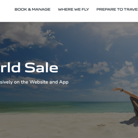 a woman sitting on a beach